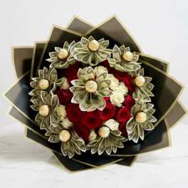 Bouquet of red and white roses wrapped with folded dollar bills