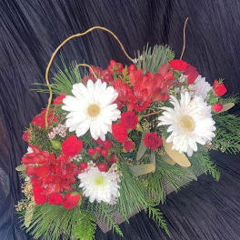 Red and white mixed flower basket with daisies and roses