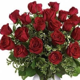 Bouquet of red roses with greenery