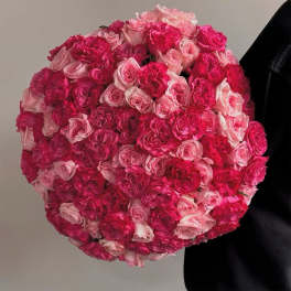 Round bouquet of pink and hot pink roses