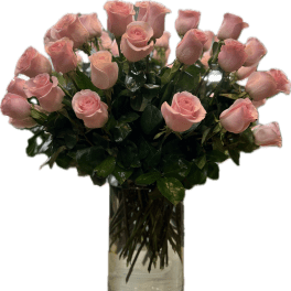 Pink roses arranged in a clear glass vase