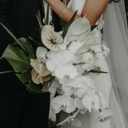 White bridal bouquet with orchids and anthuriums