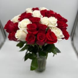 3 dozen roses in a vase