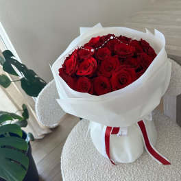 Red Bouquet With White Wrapping