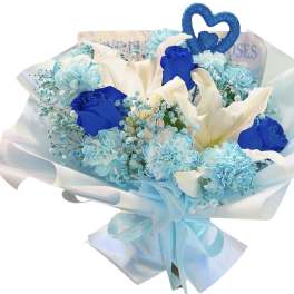 Bouquet of blue and white flowers with a heart topper