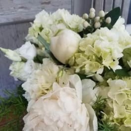 White floral bouquet with hydrangeas and peonies
