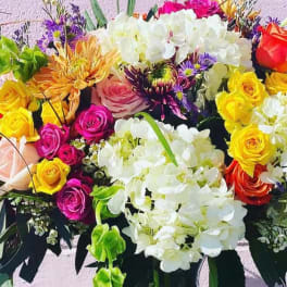 Colorful bouquet with roses, hydrangeas, and mixed blooms