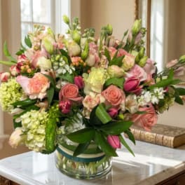 Pink and white mixed bouquet in a glass vase