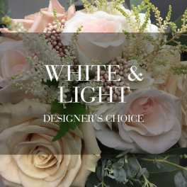 Soft pink and white roses with delicate filler flowers