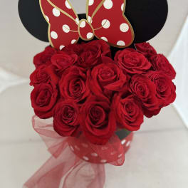 Red rose bouquet with Minnie Mouse ears and a polka-dot bow topper