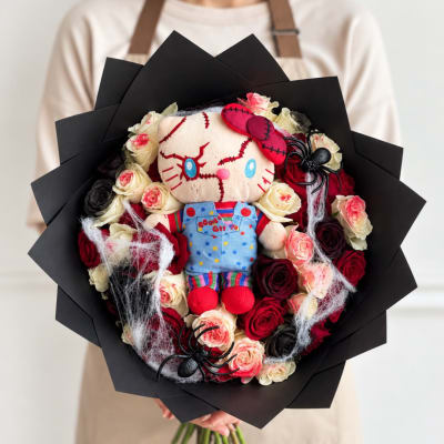 Bouquet with a plush doll, roses, and black wrapping paper