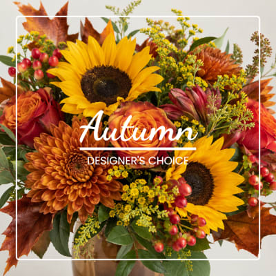 Autumn bouquet with sunflowers, orange roses, and chrysanthemums