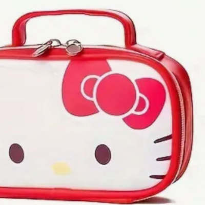 Hello Kitty lunch bag with a red handle and zipper