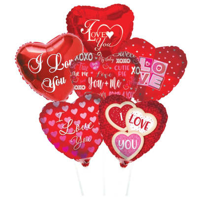 Cluster of red heart-shaped balloons with love messages