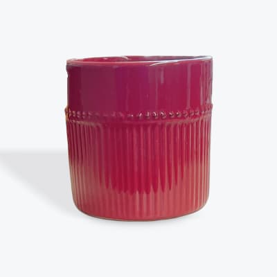 Pink ribbed ceramic vase
