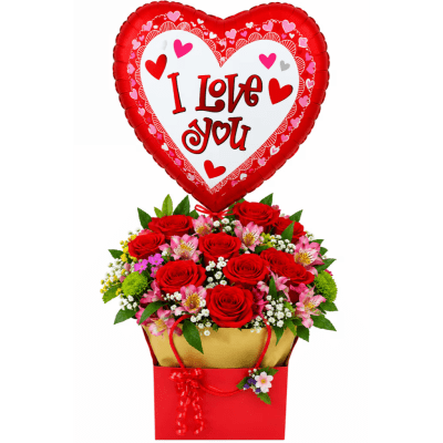 Heart-shaped balloon above a red rose bouquet in a gift bag