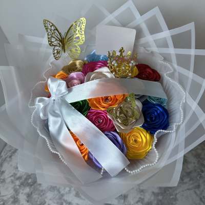 Colorful satin rose bouquet with a white ribbon and butterfly accents