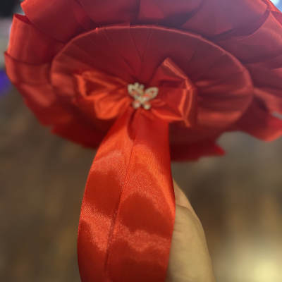 Red satin ribbon bouquet with butterfly accents