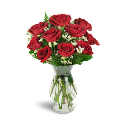 Bouquet of red roses in a clear glass vase