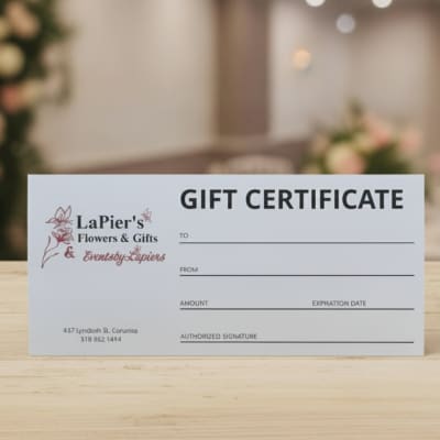 Gift certificate card from LaPier's Flowers & Gifts on a table