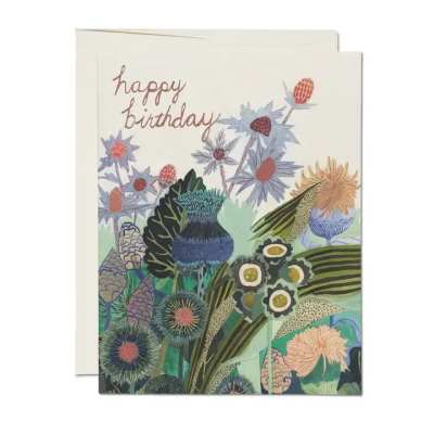 Birthday card with colorful illustrated flowers and "happy birthday" text