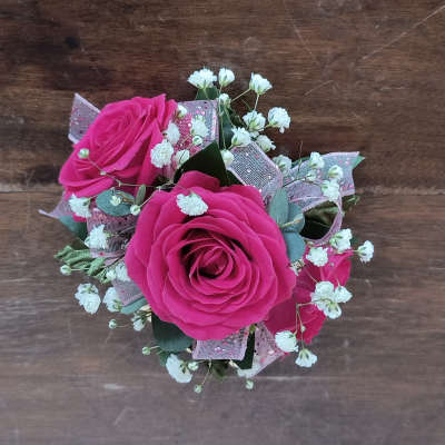 Pink roses with white baby's breath and ribbon wrap