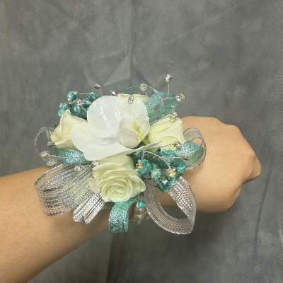 Aqua Silver Orchid spray roses corsage