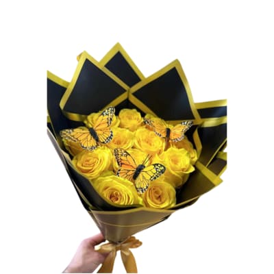 Yellow rose bouquet with butterfly decorations in black and gold wrap