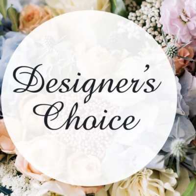 Round sign reading "Designer's Choice" over pastel flowers