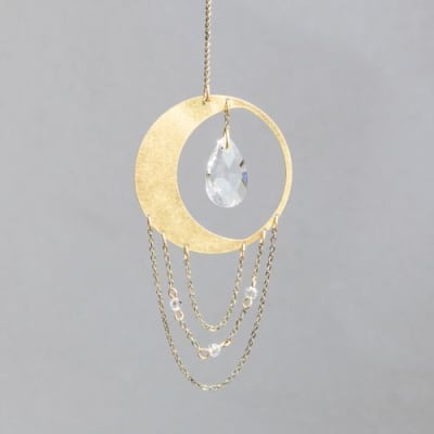 Gold crescent moon hanging ornament with crystal teardrop and dangling chains