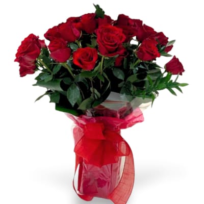 Bouquet of red roses wrapped with a red ribbon