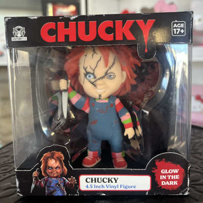 Boxed Chucky vinyl figure with a knife accessory
