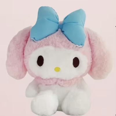 Pink plush bunny character with a blue bow