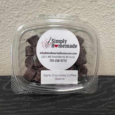 Plastic container of dark chocolate coffee beans