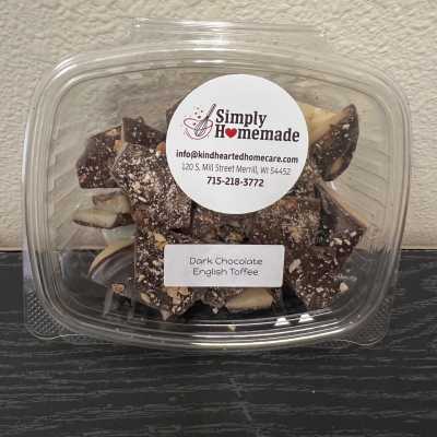 Plastic container of dark chocolate English toffee pieces