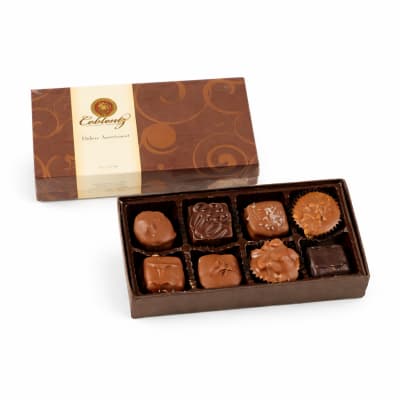 Box of assorted chocolates with a decorative lid