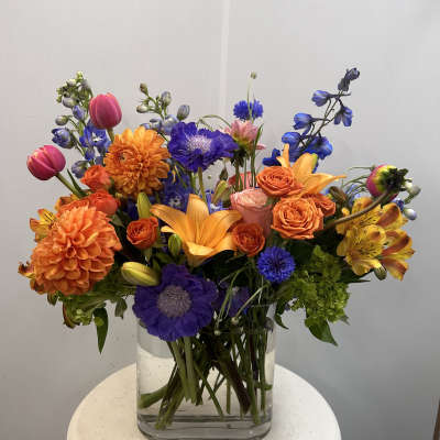 Colorful mixed bouquet in a clear glass vase