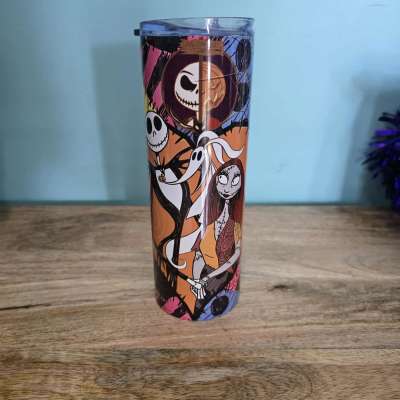 Halloween-themed insulated tumbler with cartoon characters