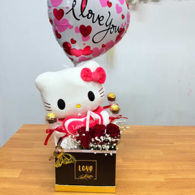 Hello Kitty gift box with heart balloon, roses, and chocolates