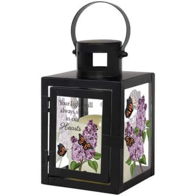 Black memorial lantern with lilac blossoms and orange butterflies on glass panels