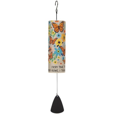 Decorative cylinder wind chime with orange butterflies, colorful flowers, and an inspirational quote.