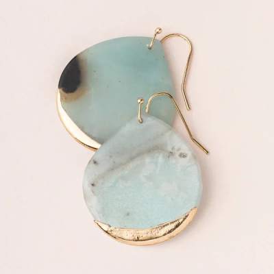 Pair of light blue drop earrings with gold accents and hooks.
