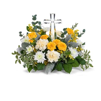 Yellow and white floral arrangement with a clear glass cross