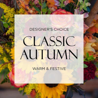 Autumn bouquet with sunflowers, roses, and mixed blooms