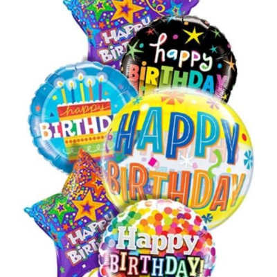 Cluster of colorful birthday balloons with star and round shapes