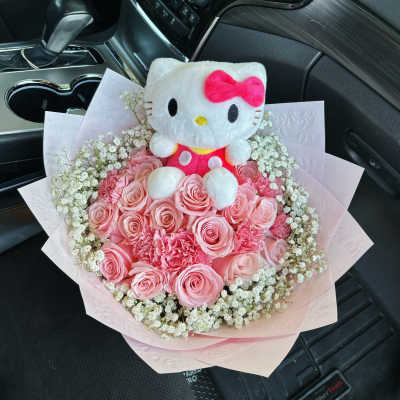 Pink rose bouquet with a Hello Kitty plush toy