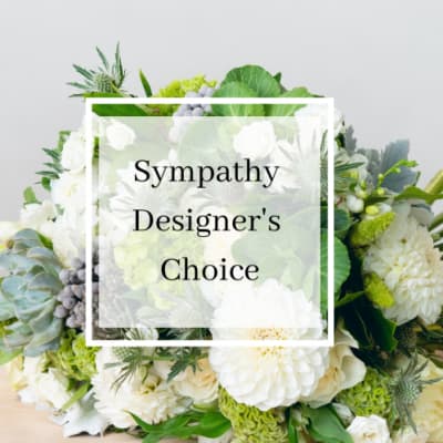 White sympathy bouquet with mixed flowers and greenery