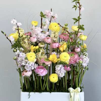 Tall mixed bouquet in a white rectangular box with pink and yellow blooms