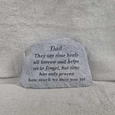 Gray memorial stone plaque with engraved tribute text for a dad