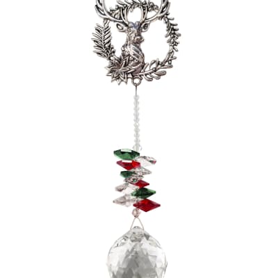 Hanging silver deer ornament with red, green, and clear crystals and a faceted crystal ball